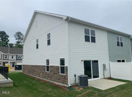 6927 Eddy Point Lane Raleigh, NC 27616 - Photo 27 of 27 a view of a white house next to a yard