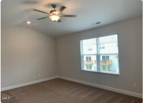 6927 Eddy Point Lane Raleigh, NC 27616 - Photo 9 of 27 an empty room with a window and a fan