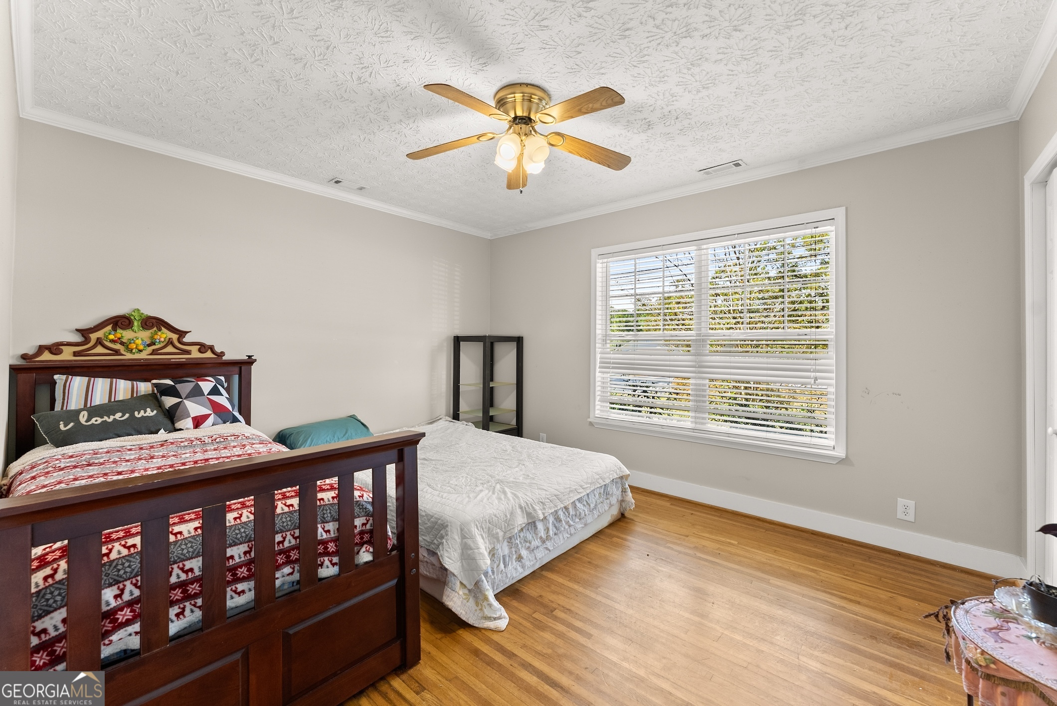 2003 West Currahee Street Toccoa, GA 30577 - Photo 22 of 34 a bedroom with furniture and a window