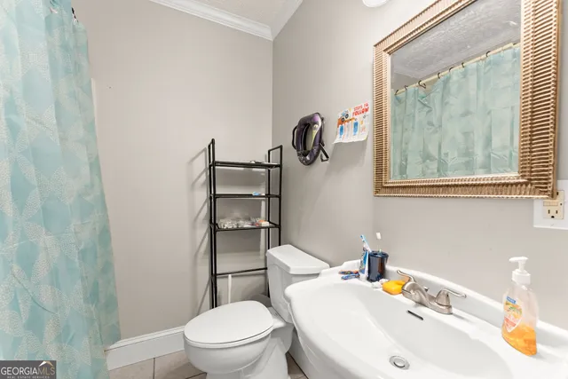 a view of a backyard with large trees