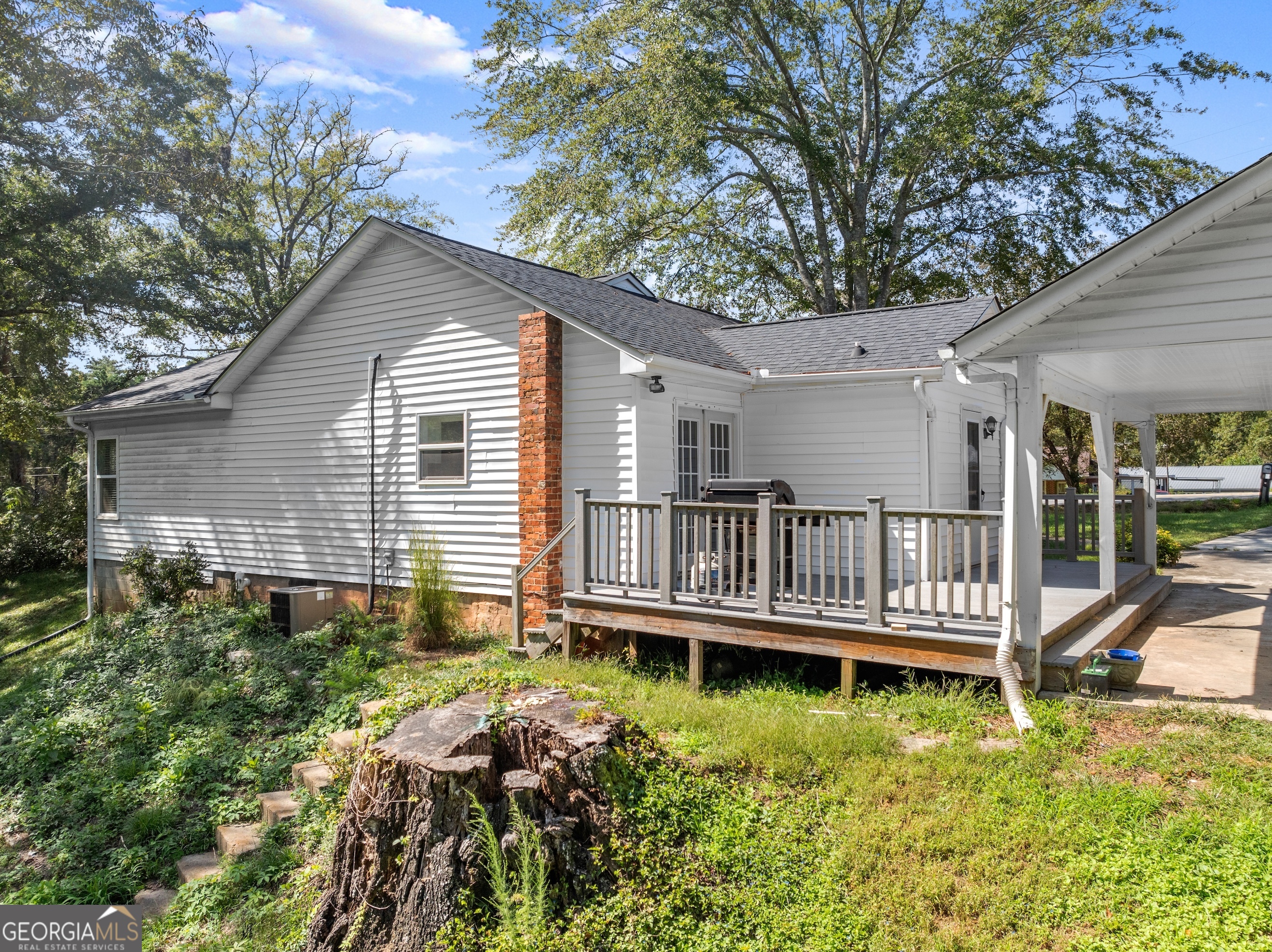 2003 West Currahee Street Toccoa, GA 30577 - Photo 28 of 34 a view of a house with a deck