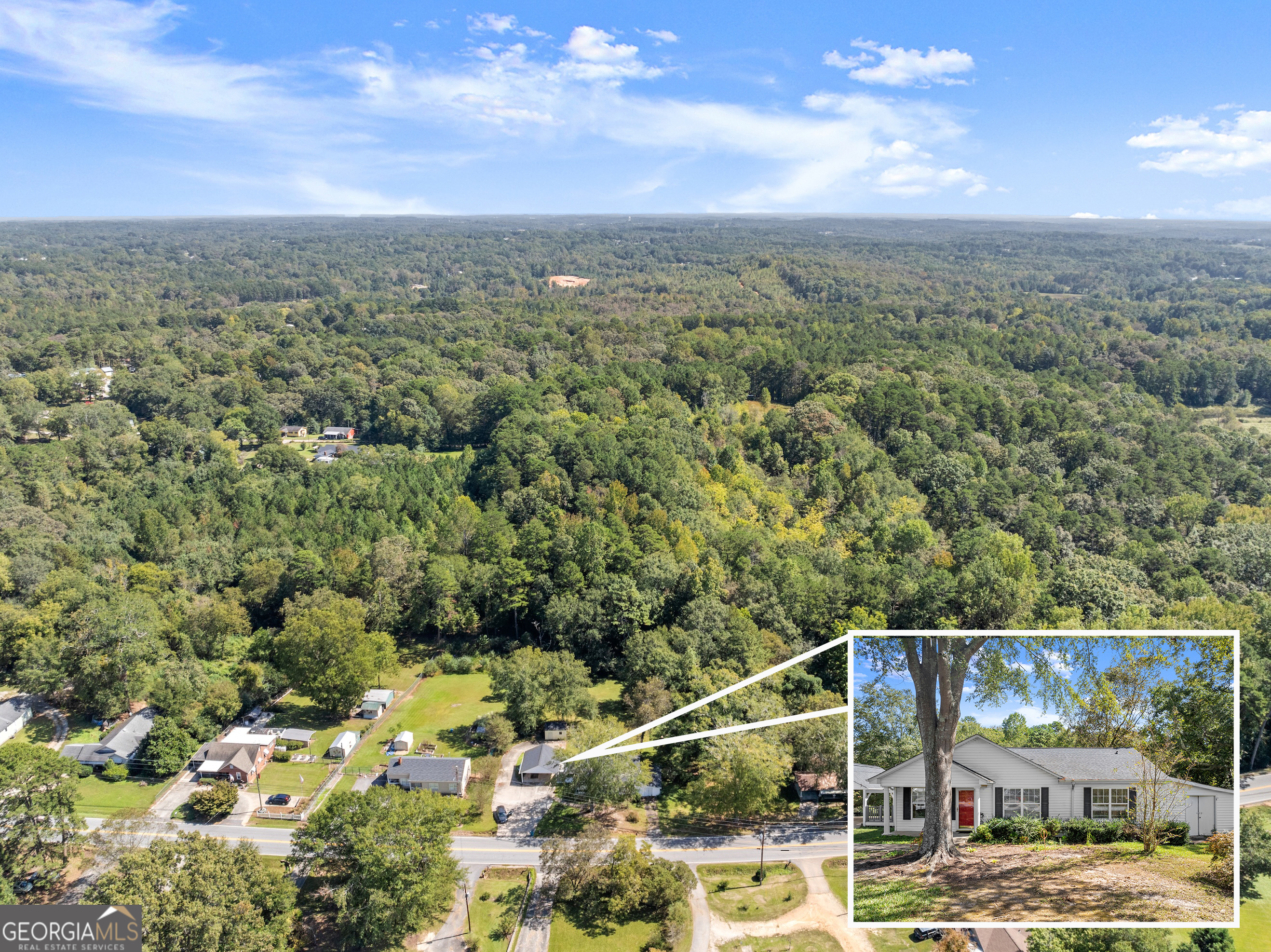 2003 West Currahee Street Toccoa, GA 30577 - Photo 32 of 34 a view of a city with lush green forest