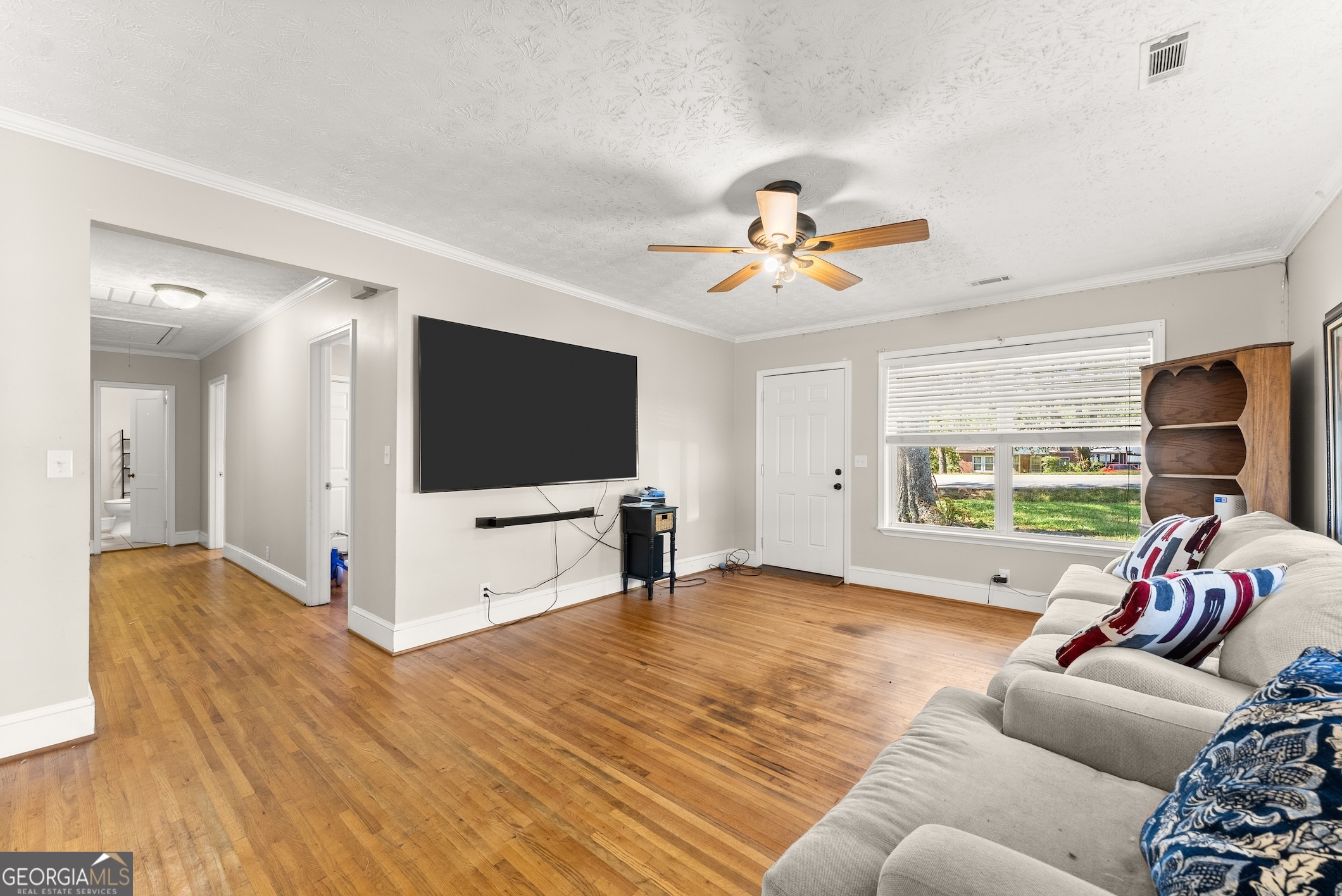 2003 West Currahee Street Toccoa, GA 30577 - Photo 7 of 34 a living room with furniture and a flat screen tv