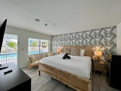 a bathroom with a shower a toilet and sink