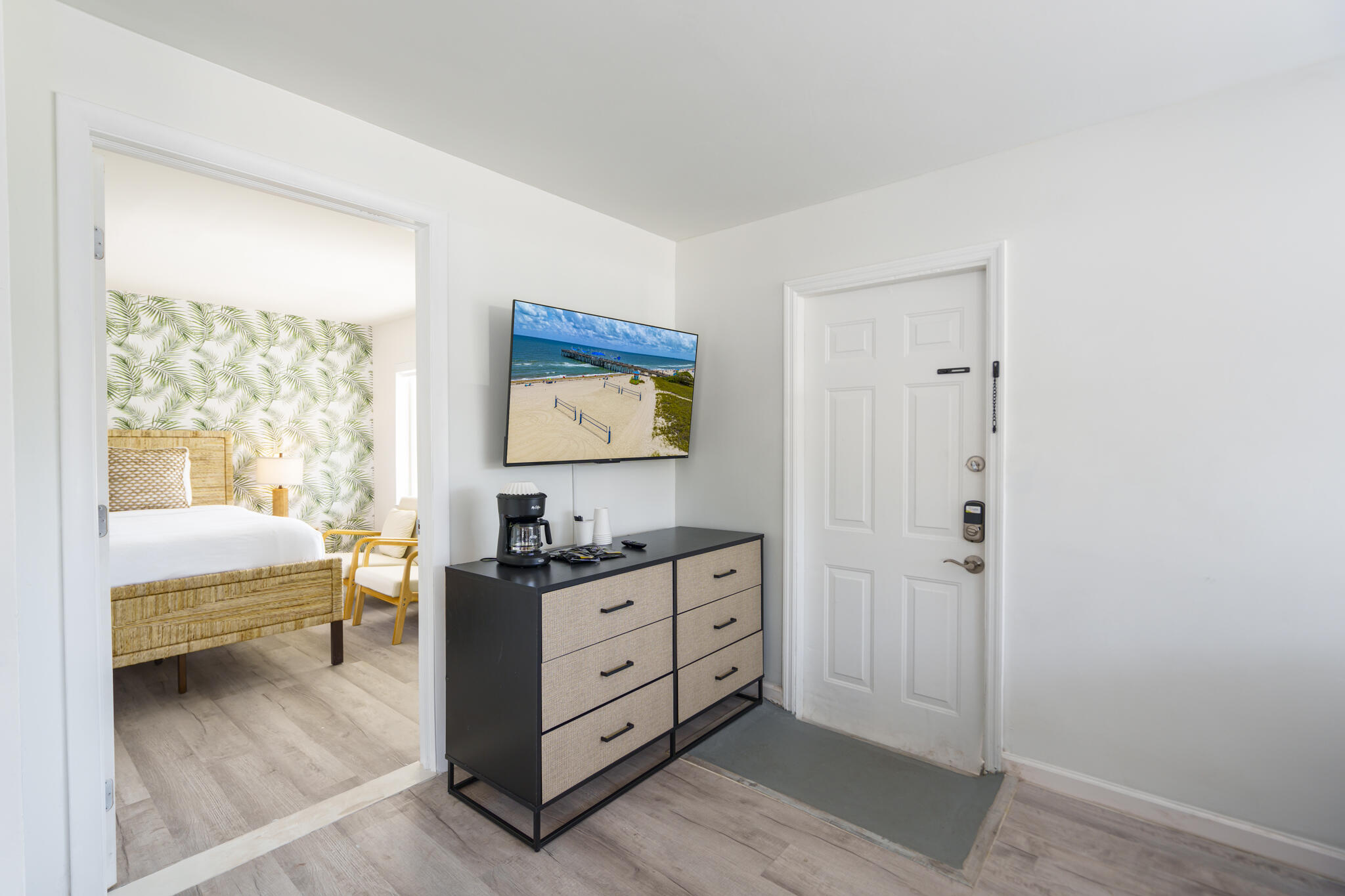 1020 North Riverside Drive Pompano Beach, FL 33062 - Photo 27 of 32 a room with a dresser and a window