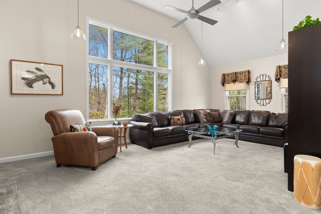 7 Derosier Drive Middleton, MA 01949 - Photo 13 of 42 a living room with furniture and windows