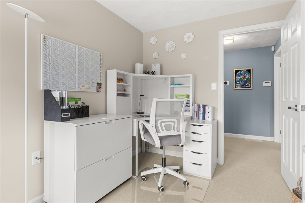 7 Derosier Drive Middleton, MA 01949 - Photo 30 of 42 a view of a kitchen with furniture and white cabinets