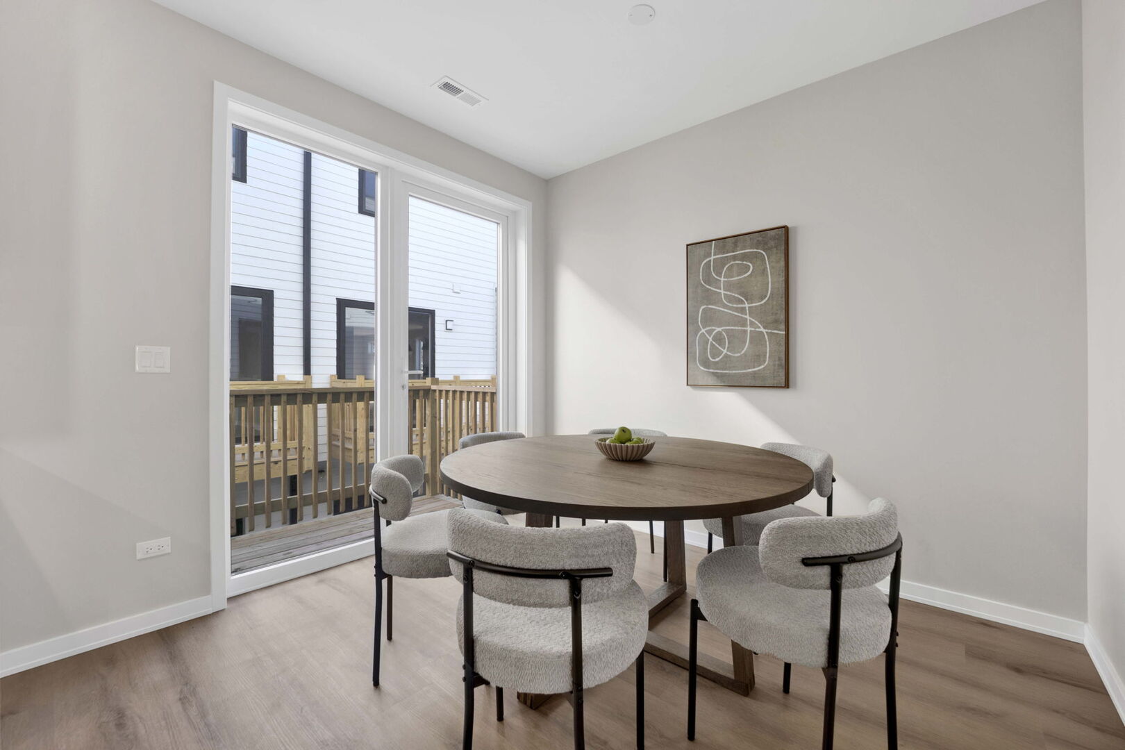 944 Beloit Avenue, Unit 4 Forest Park, IL 60130 - Photo 12 of 31 a view of a dining room with furniture and wooden floor