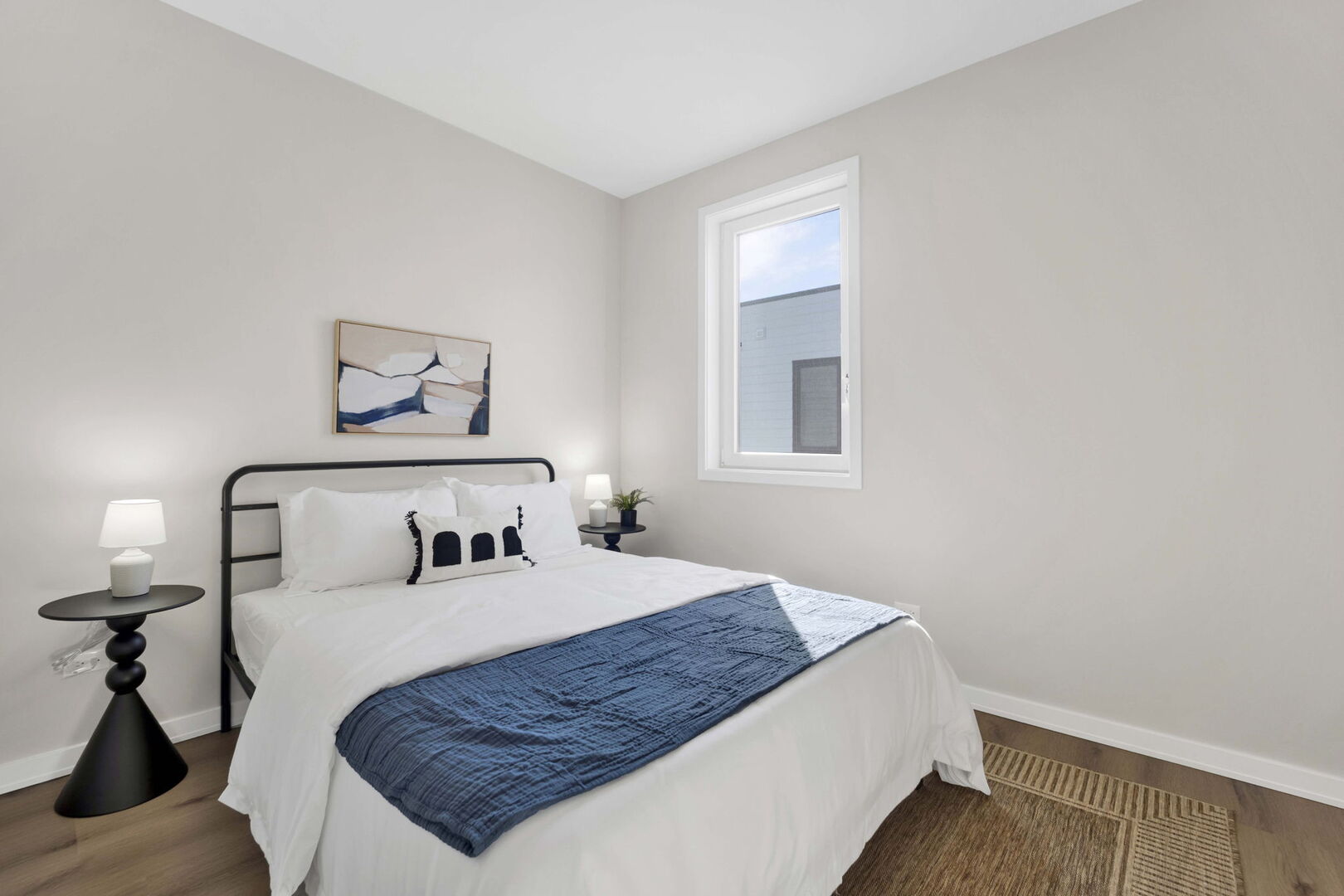 944 Beloit Avenue, Unit 4 Forest Park, IL 60130 - Photo 22 of 31 a bedroom with a bed and a night stand