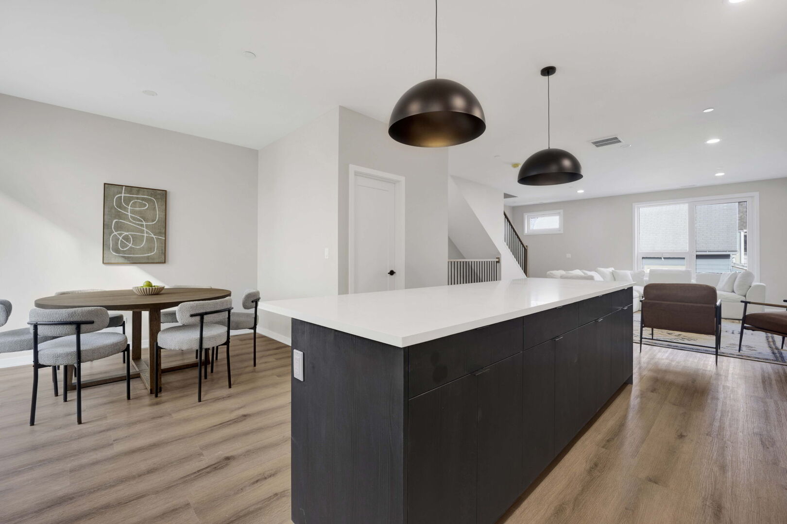 944 Beloit Avenue, Unit 4 Forest Park, IL 60130 - Photo 10 of 31 a kitchen with a table chairs and wooden floor