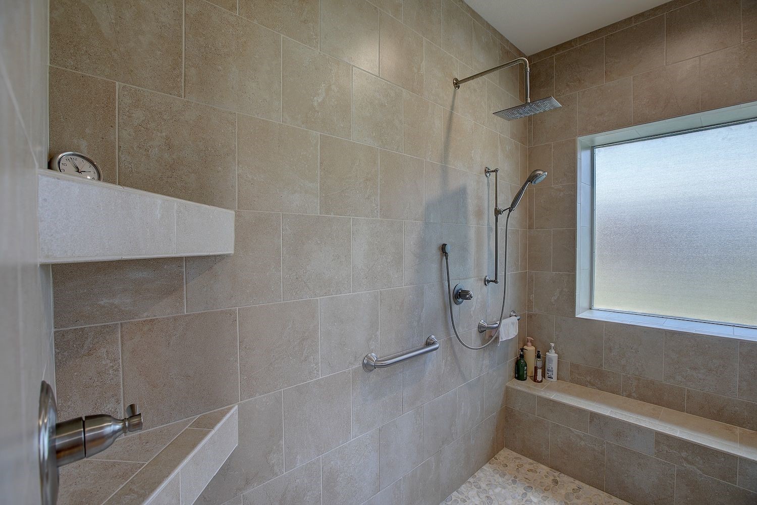 9414 Laird Road Round Top, TX 78954 - Photo 37 of 50 Interior bathroom, walk-in shower is massive with a shower seat and loads of light that is filtered
