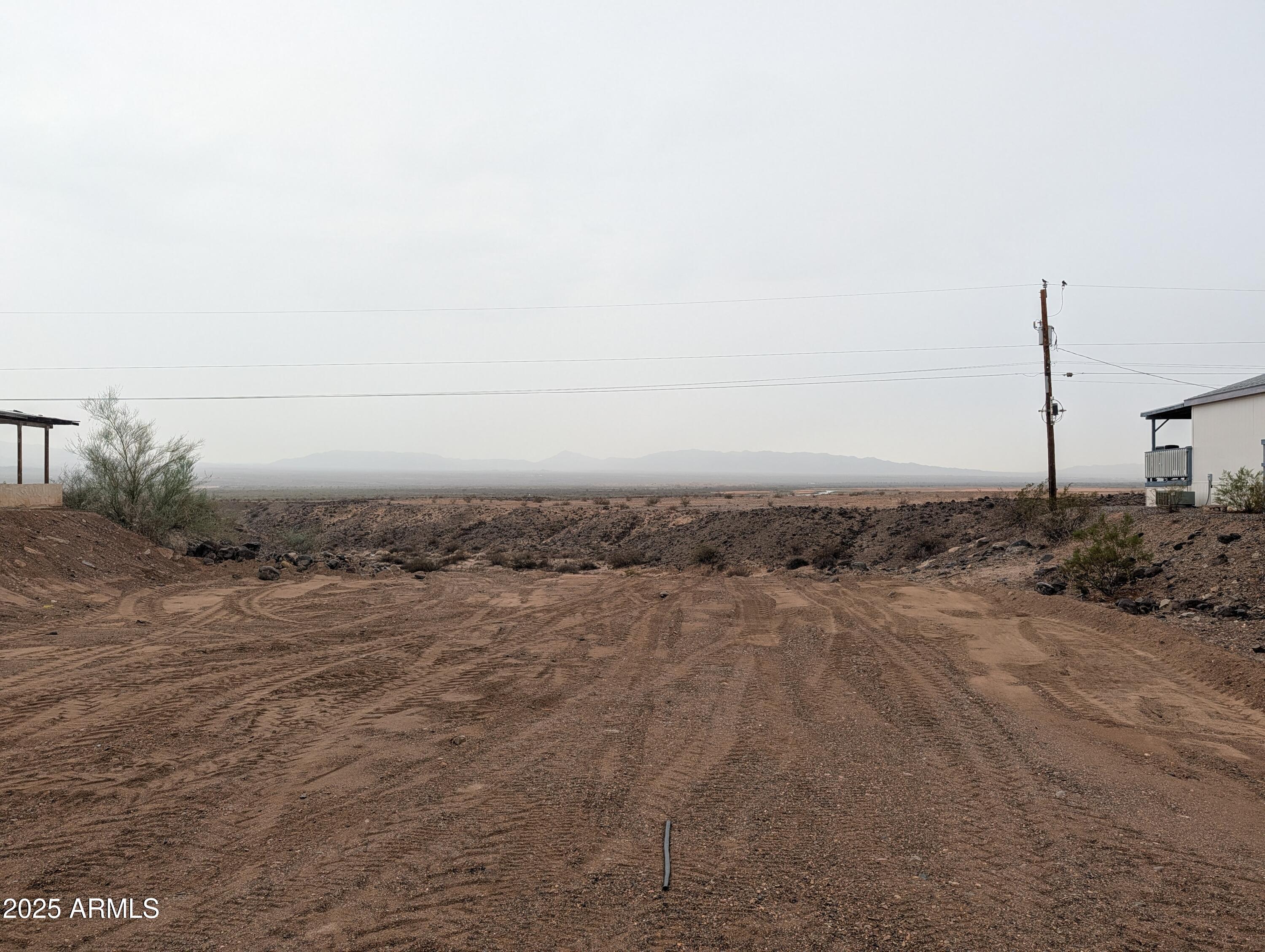 13313 Alturas Road, Unit 8 Golden Shores, AZ 86436 - Photo 2 of 4 a view of a beach and ocean view