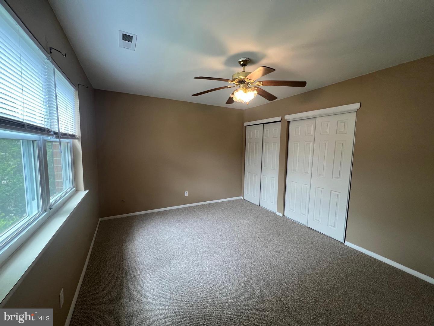 14 U Rose Rita Terrace Hammonton, NJ 08037 - Photo 8 of 10 an empty room with windows and fan