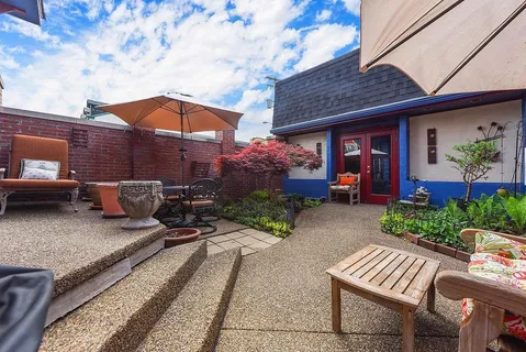 a view of a house with a patio