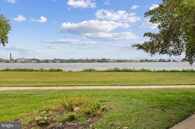 a view of a house with a flower garden