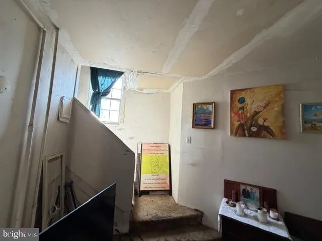 a view of a hallway with workspace