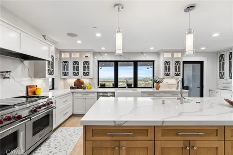 a bedroom with a bed and a mirror