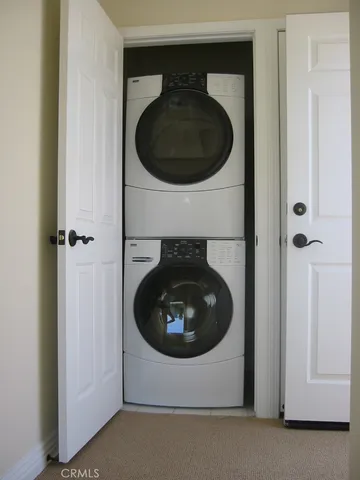 a close view of a utility and dryer and washer in a utility room