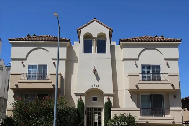 a front view of a house with yard