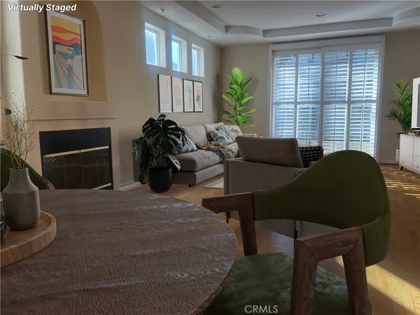 a living room with furniture lamp and a fireplace