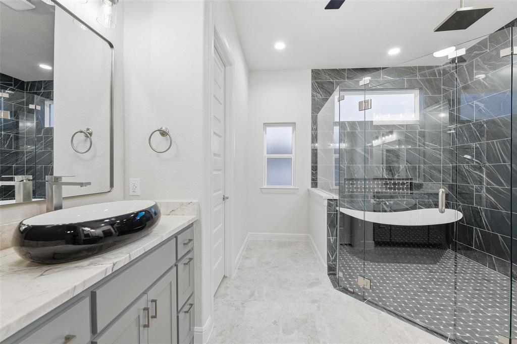 189 Rio Rancho Drive Decatur, TX 76234 - Photo 18 of 36 Bathroom with a stall shower, vanity, and recessed lighting