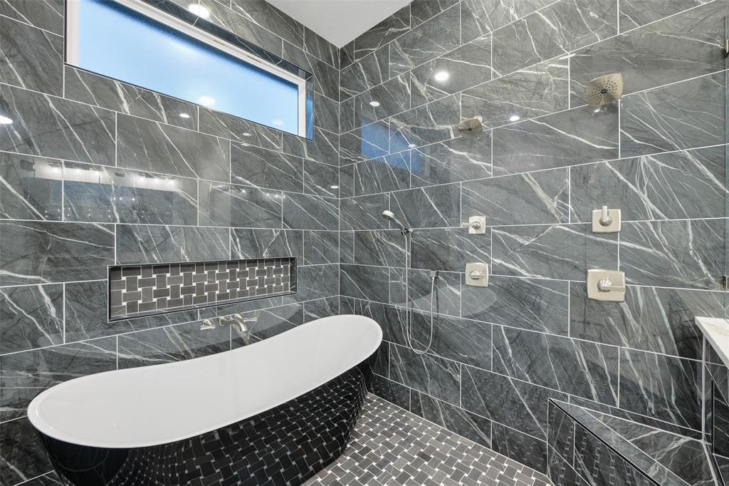 189 Rio Rancho Drive Decatur, TX 76234 - Photo 20 of 36 Full bath featuring tile walls and a freestanding bath