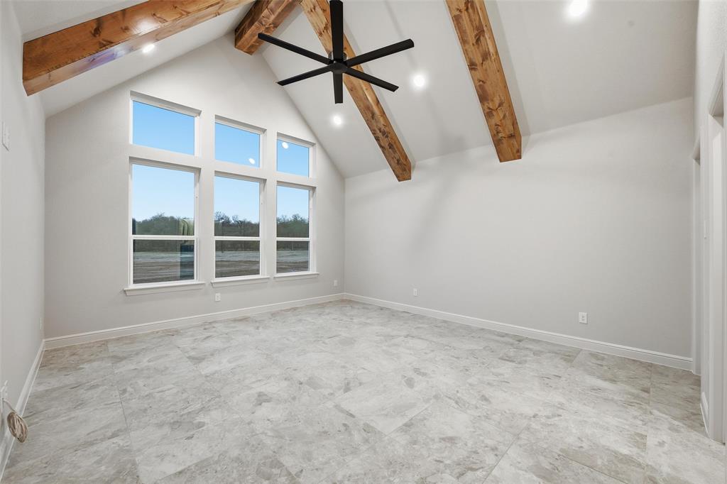 189 Rio Rancho Drive Decatur, TX 76234 - Photo 23 of 36 Bonus room featuring high vaulted ceiling, beam ceiling, ceiling fan, and recessed lighting