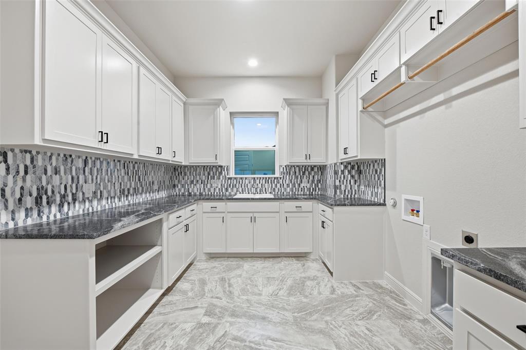 189 Rio Rancho Drive Decatur, TX 76234 - Photo 28 of 34 Laundry room with hookup for a washing machine, cabinet space, electric dryer hookup, and recessed lighting
