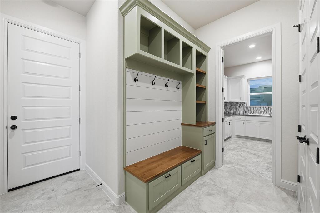 189 Rio Rancho Drive Decatur, TX 76234 - Photo 29 of 34 Mudroom with baseboards and recessed lighting