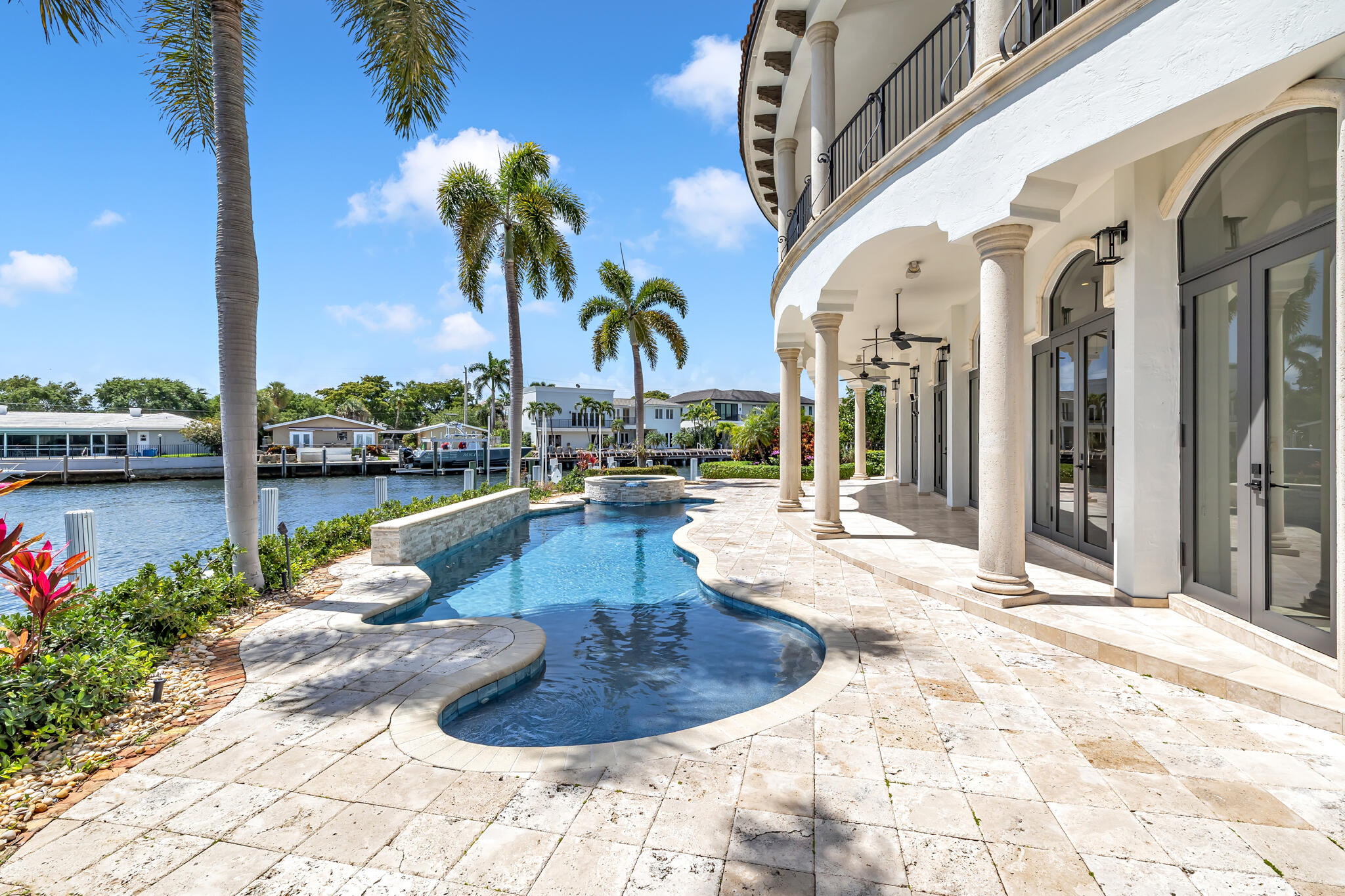 3700 Northeast 28th Avenue Lighthouse Point, FL 33064 - Photo 13 of 77 a view of a swimming pool with an outdoor seating