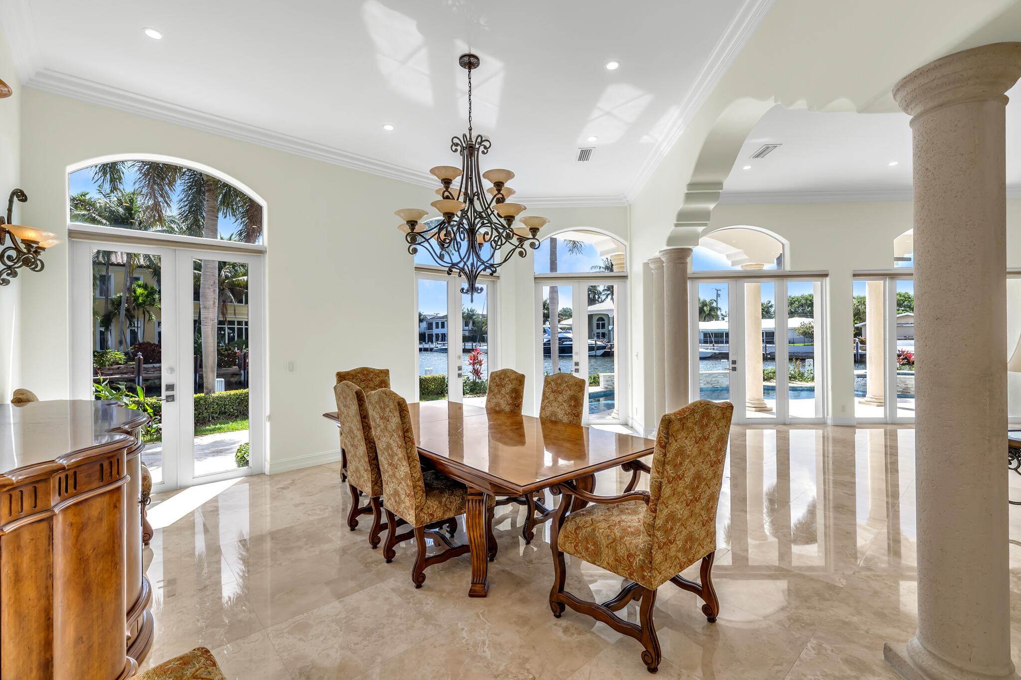 3700 Northeast 28th Avenue Lighthouse Point, FL 33064 - Photo 26 of 77 a view of a dining room with furniture and chandelier