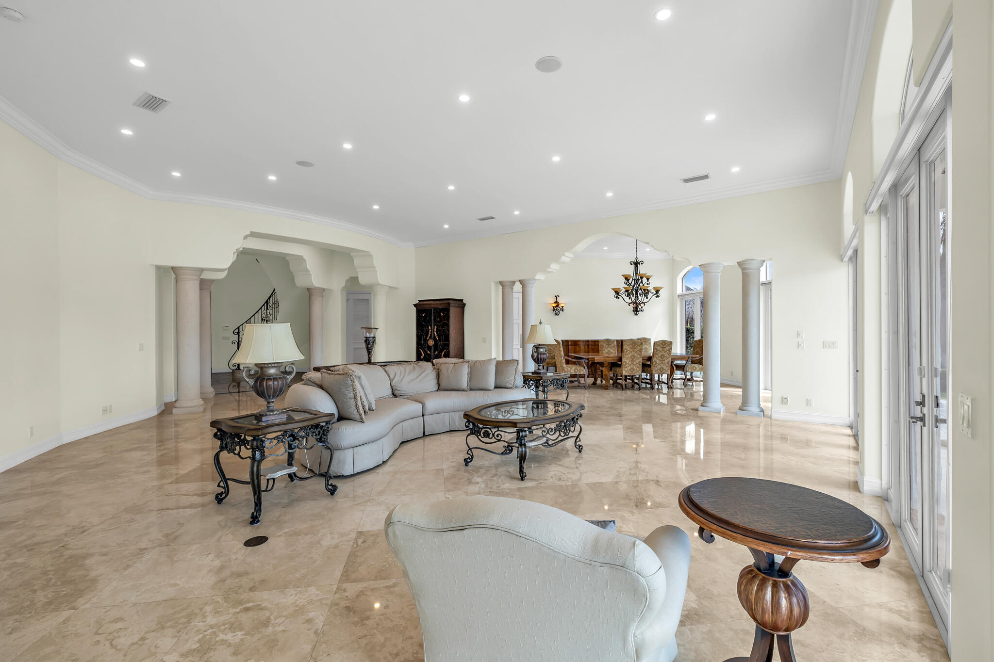 3700 Northeast 28th Avenue Lighthouse Point, FL 33064 - Photo 27 of 77 a living room with furniture and a chandelier