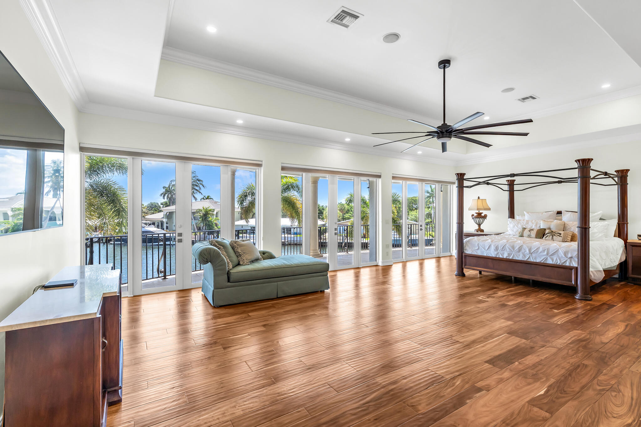 3700 Northeast 28th Avenue Lighthouse Point, FL 33064 - Photo 32 of 77 a view of a livingroom with furniture wooden floor windows and a chandelier