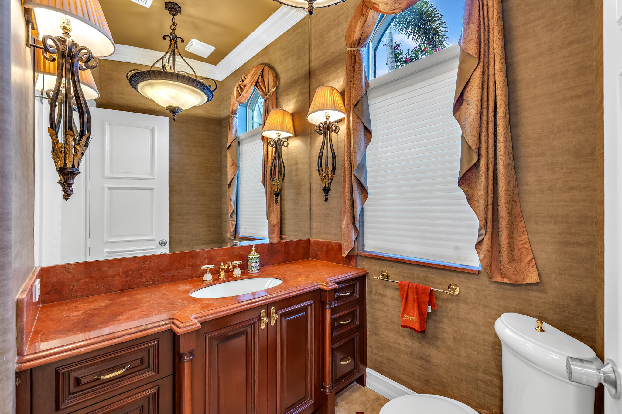 3700 Northeast 28th Avenue Lighthouse Point, FL 33064 - Photo 44 of 77 a bathroom with a granite countertop sink and a mirror