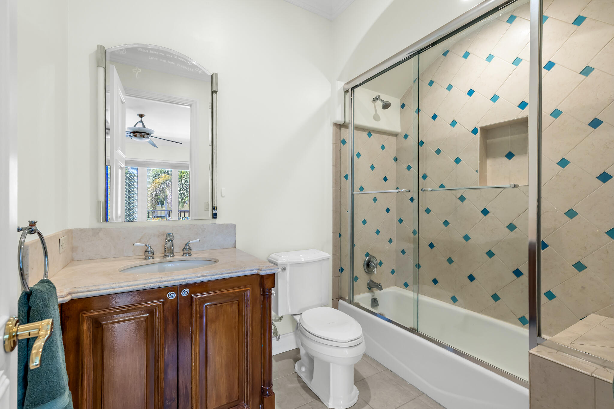 3700 Northeast 28th Avenue Lighthouse Point, FL 33064 - Photo 52 of 77 a bathroom with a sink toilet and shower