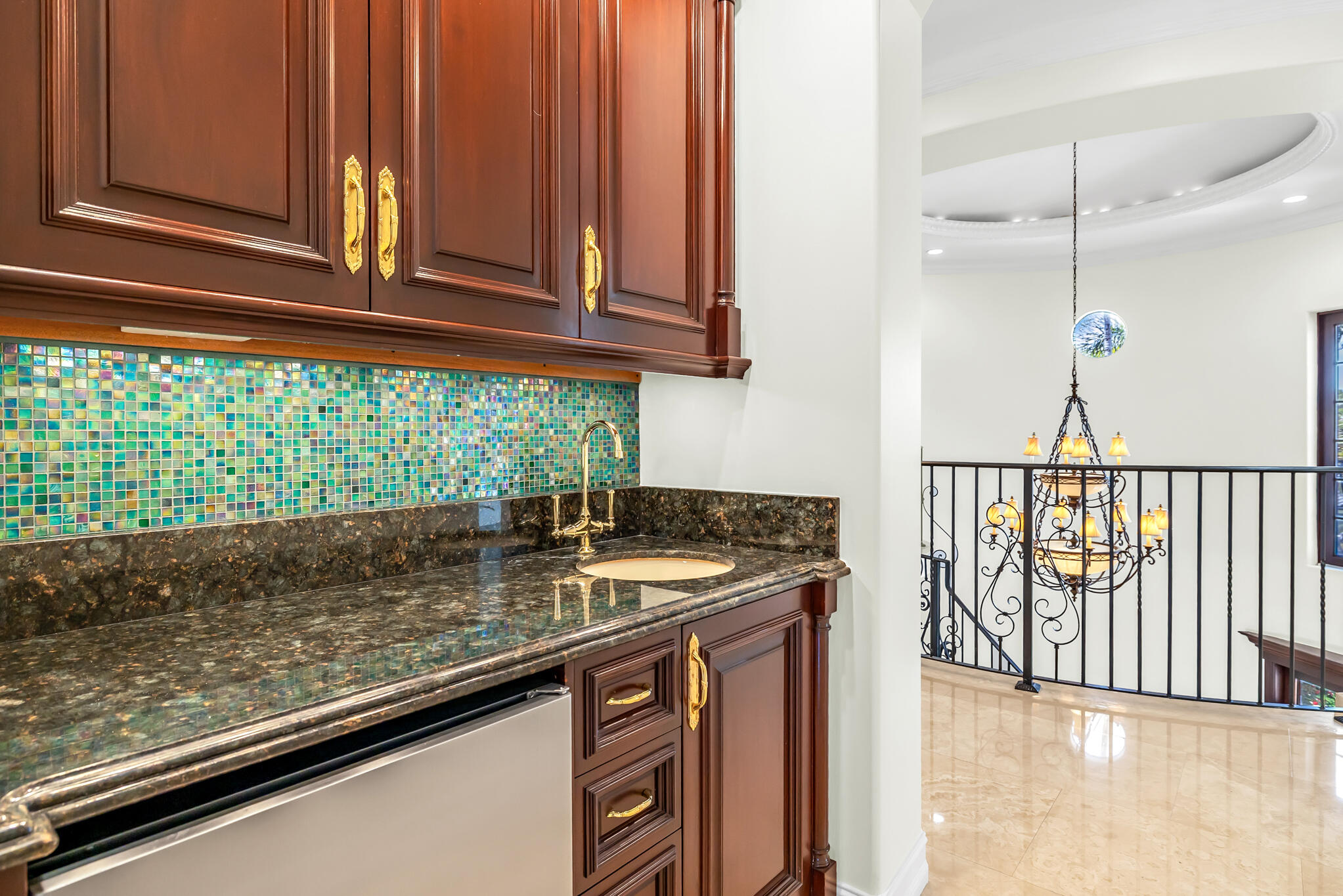 3700 Northeast 28th Avenue Lighthouse Point, FL 33064 - Photo 54 of 77 a kitchen with a sink and cabinets