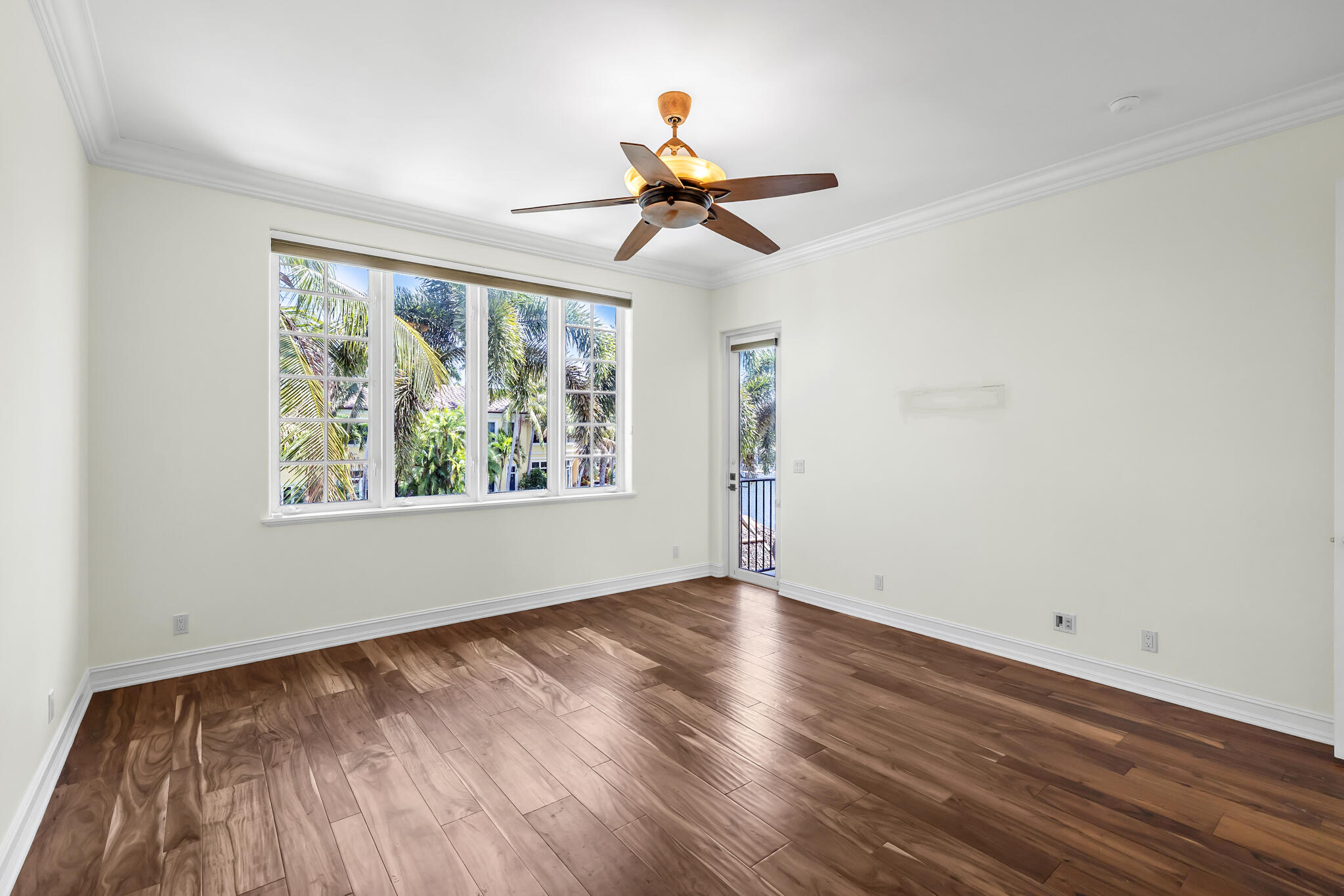 3700 Northeast 28th Avenue Lighthouse Point, FL 33064 - Photo 57 of 77 a view of empty room with wooden floor and fan