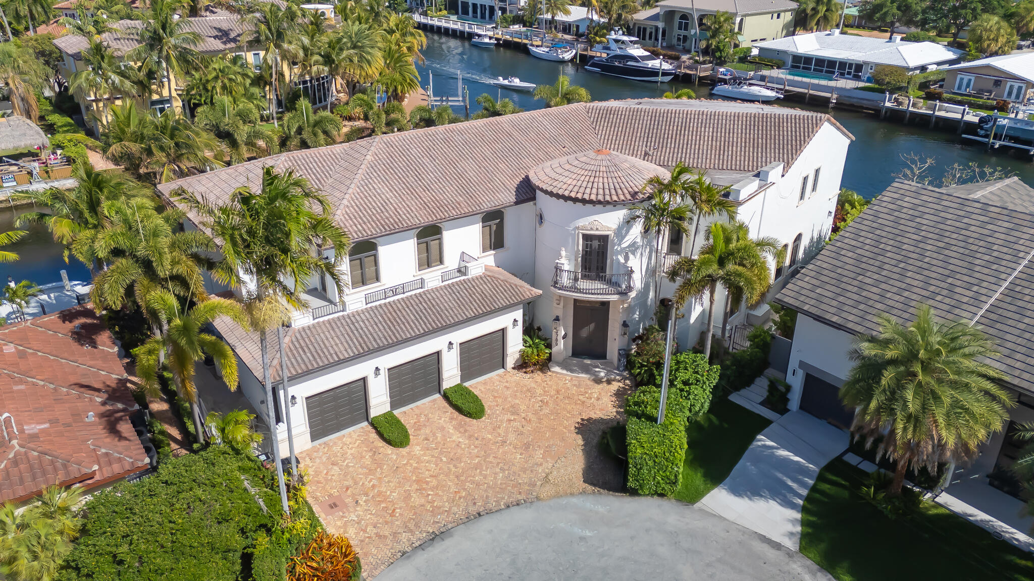 3700 Northeast 28th Avenue Lighthouse Point, FL 33064 - Photo 6 of 77 a aerial view of a house with garden space and sitting area