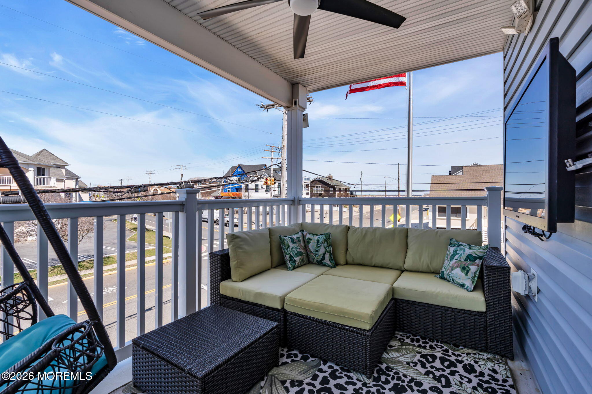 1301 Ocean Avenue, Unit 4 Point Pleasant Beach, NJ 08742 - Photo 11 of 13 a balcony with furniture