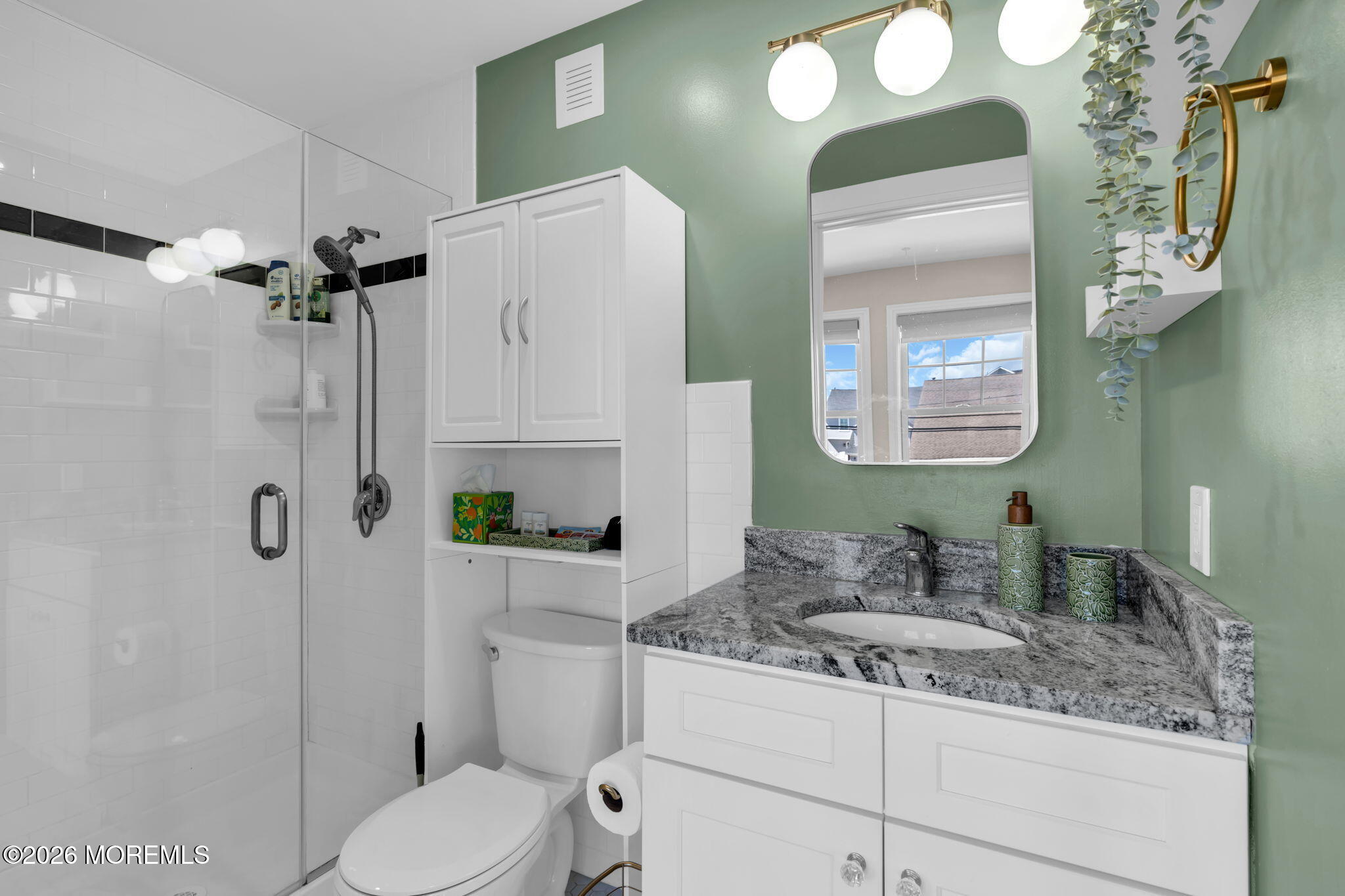 1301 Ocean Avenue, Unit 4 Point Pleasant Beach, NJ 08742 - Photo 4 of 13 a bathroom with a granite countertop sink toilet and shower