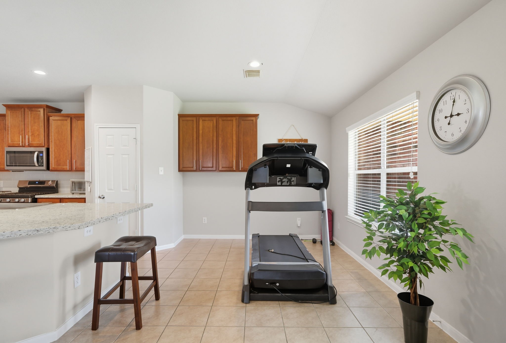 25707 Crisp Spring Lane Spring, TX 77373 - Photo 4 of 10 a living room with furniture and a potted plant