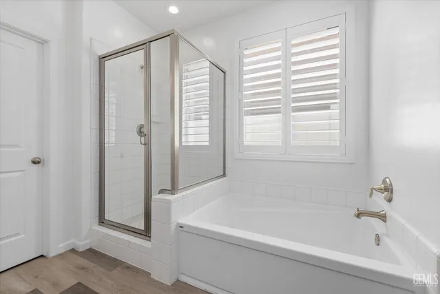 a house with swimming pool in front of it