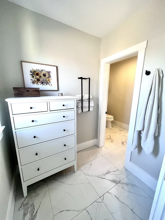 27 Armandine Street, Unit 3 Boston, MA 02124 - Photo 10 of 17 a view of a dresser in the back room