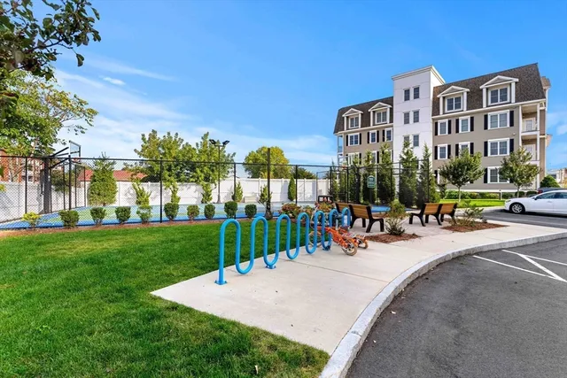 a view of a building with a yard