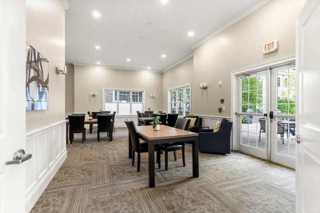 a view of a livingroom with furniture and window