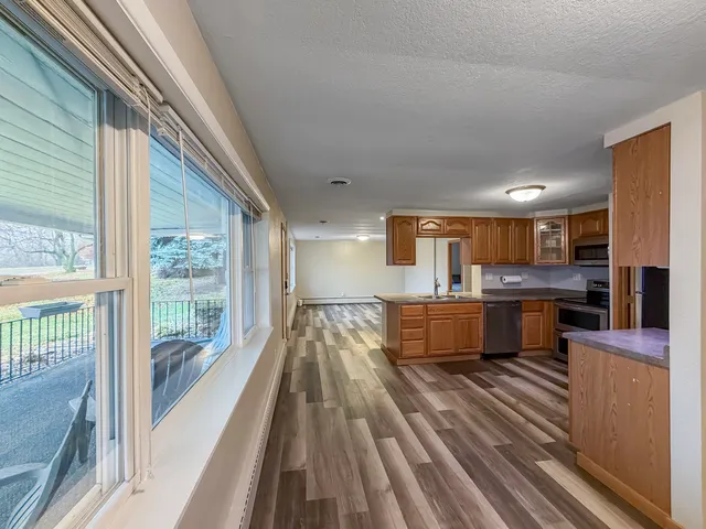 a large open kitchen with a large window