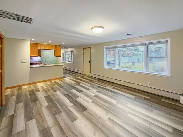 a view of an empty room and window