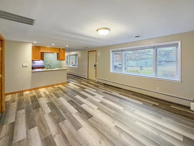 a view of an empty room and window
