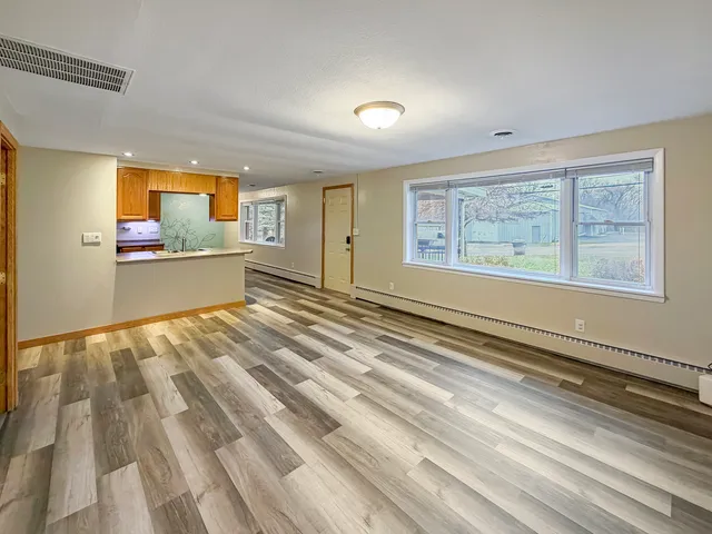 a view of an empty room and window