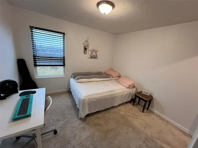 a bathroom with a double vanity sink toilet and shower
